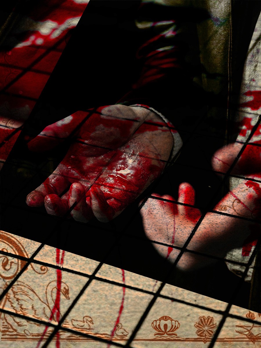 A close-up of red-stained hands above a patterned floor.